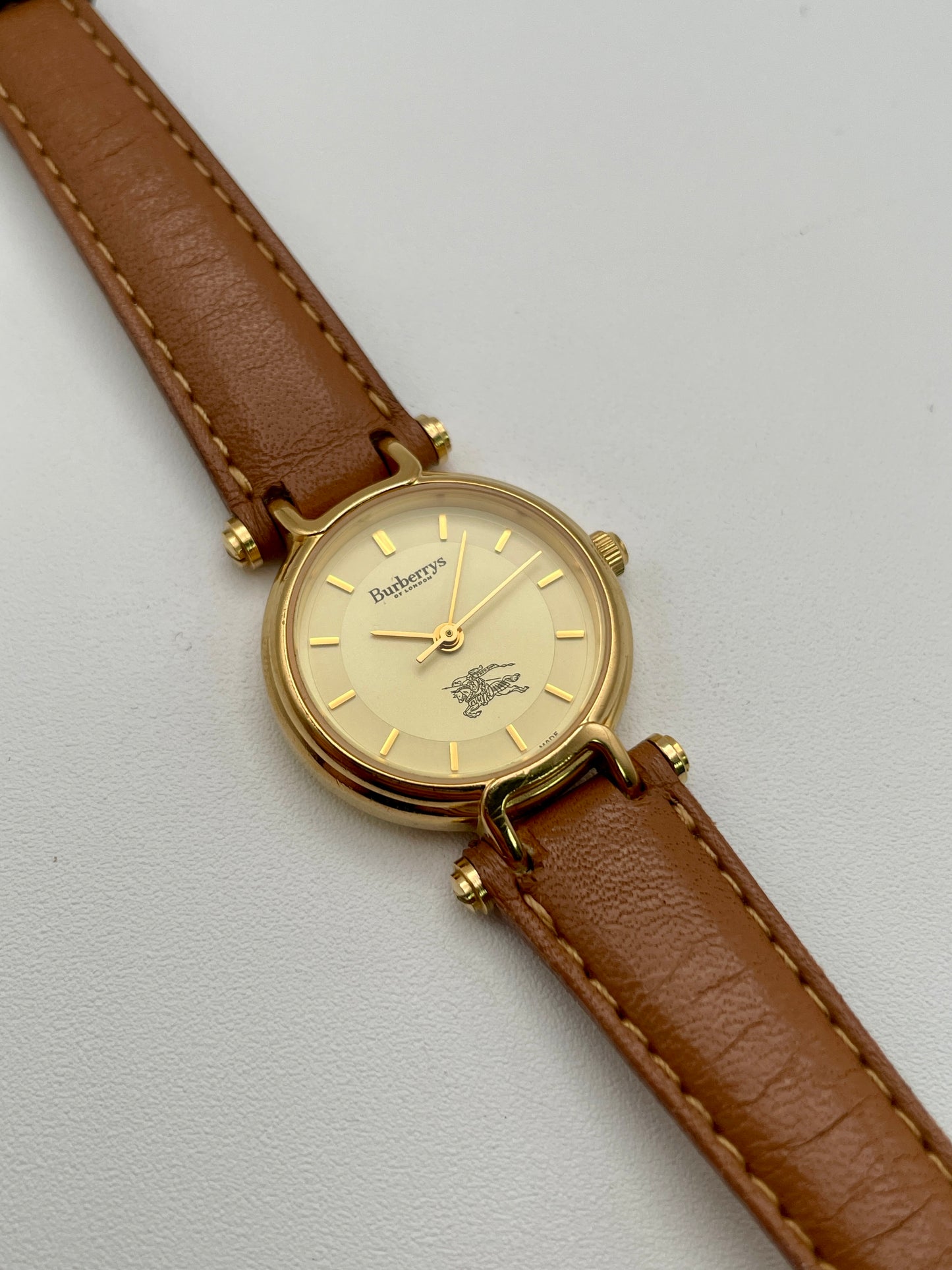 Main view of Burberry 3200 vintage women’s watch in gold with light brown leather strap