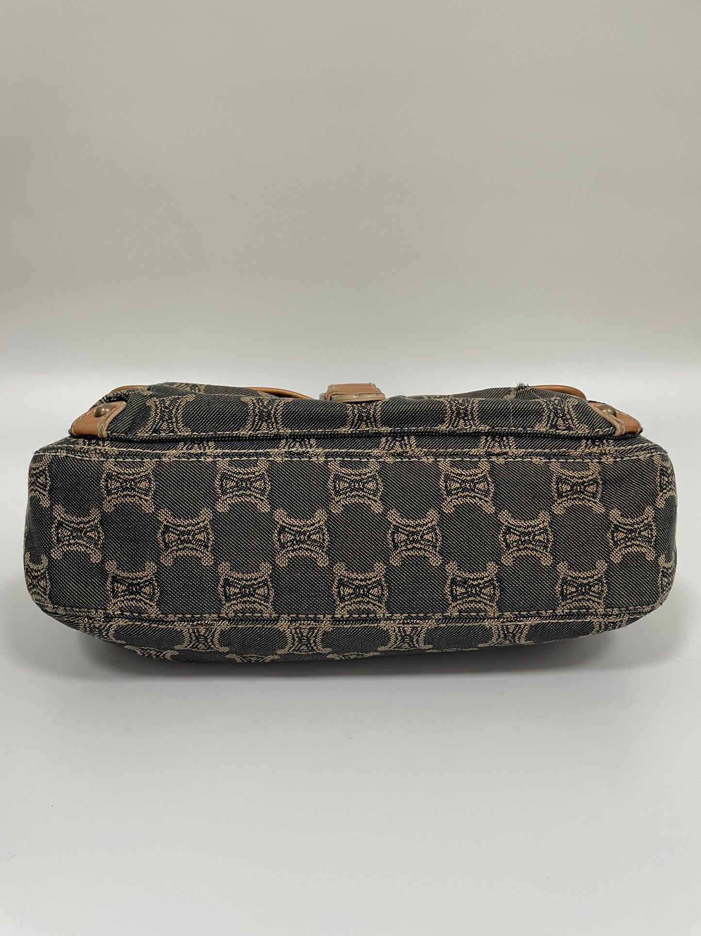 Bottom view of the Celine Macadam Shoulder Bag in denim, highlighting the signature Celine Macadam pattern.