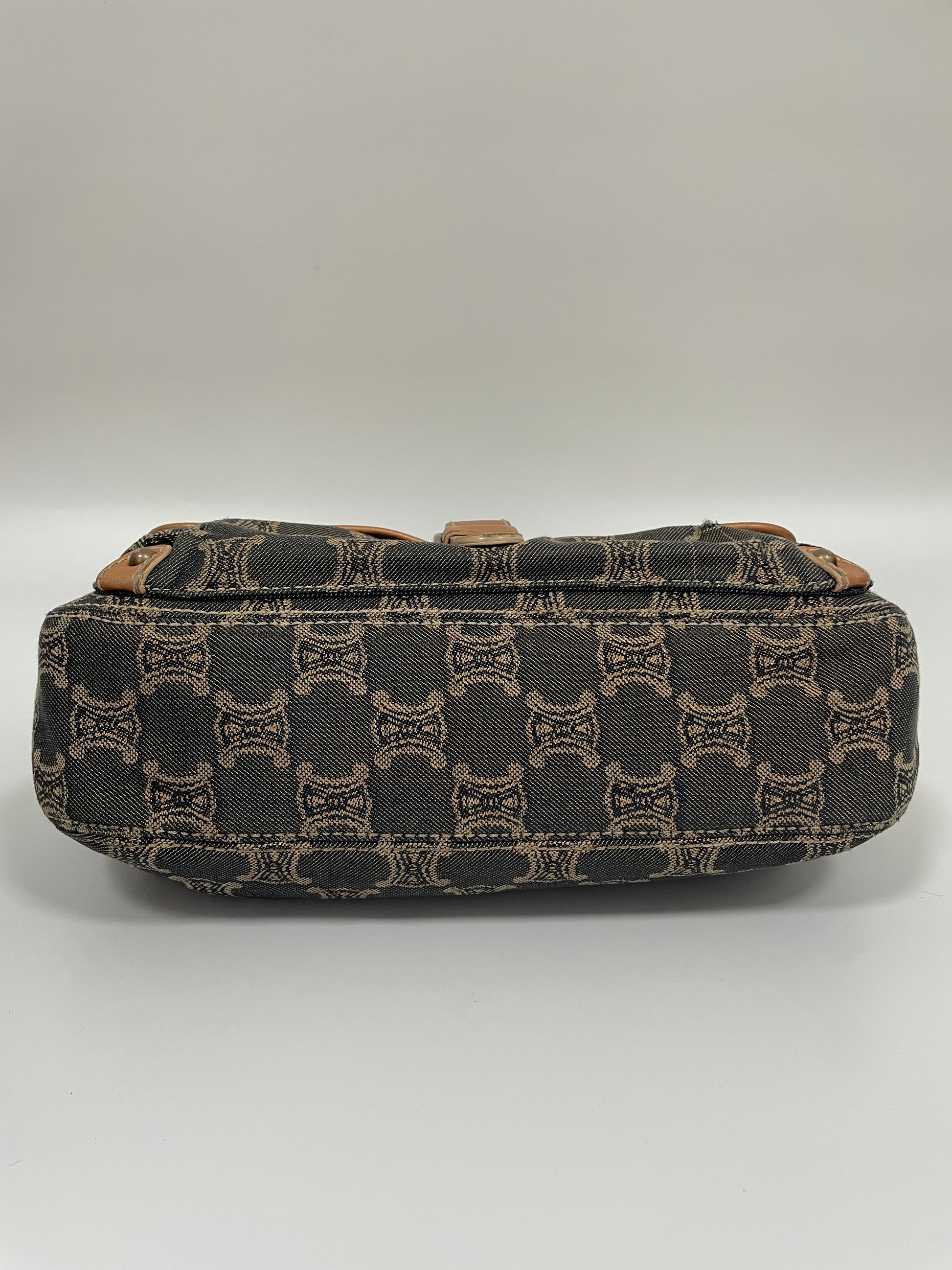 Bottom view of the Celine Macadam Shoulder Bag in denim, highlighting the signature Celine Macadam pattern.