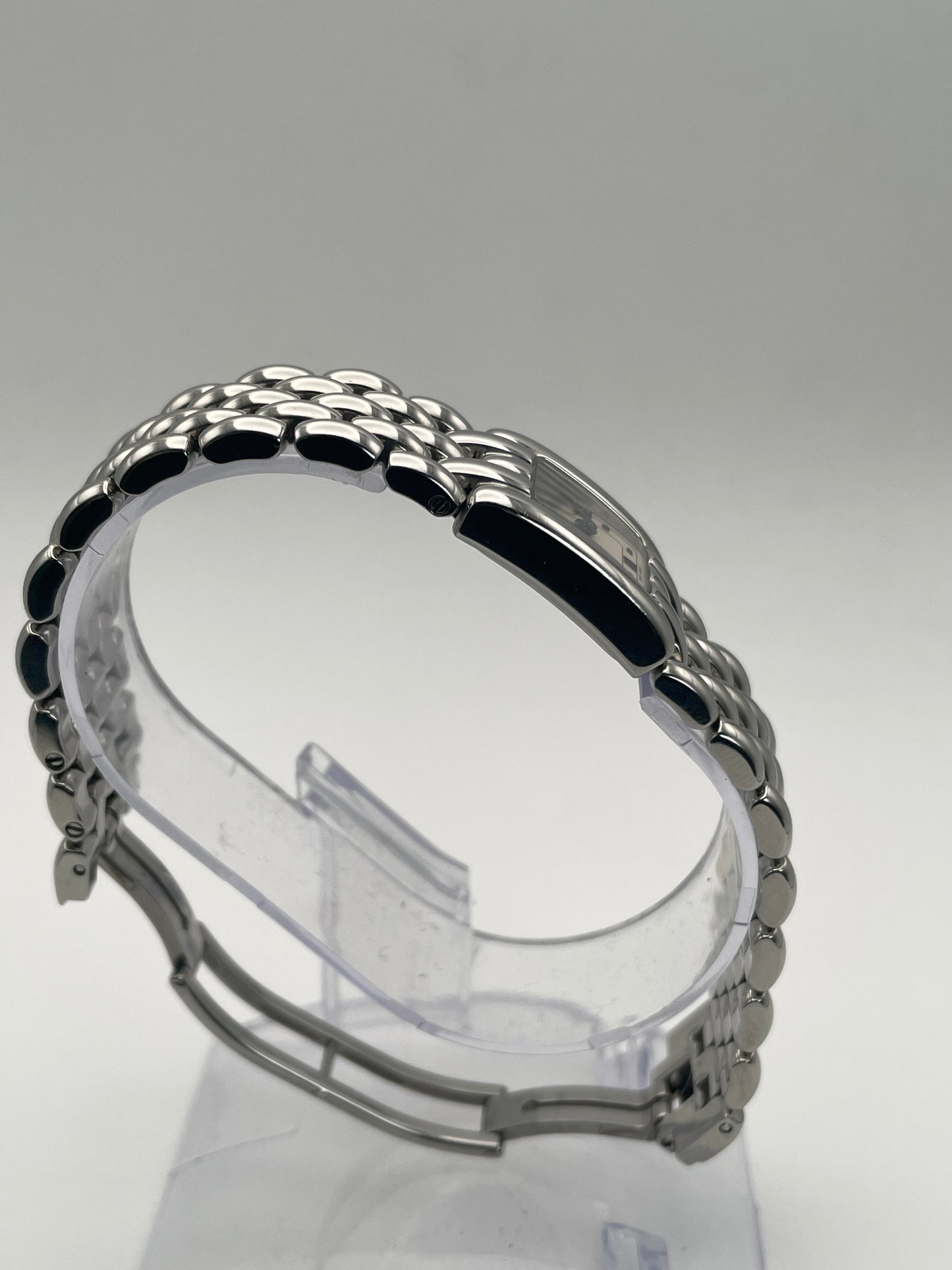 Side profile of Chaumet Khesis Vintage Ladies Watch showing the stainless steel bracelet.