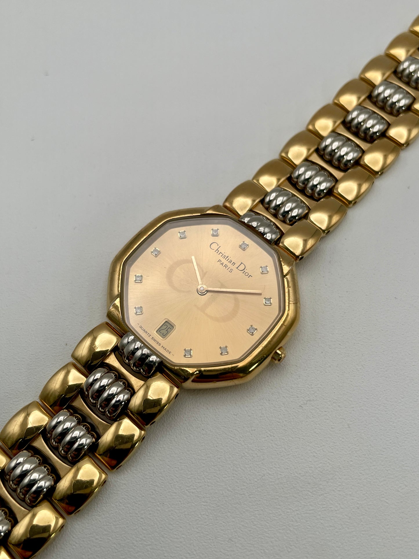 Christian Dior Déposé Octagon Vintage Women's Watch in a diagonal angle, showing the dial, case, and bracelet details.
