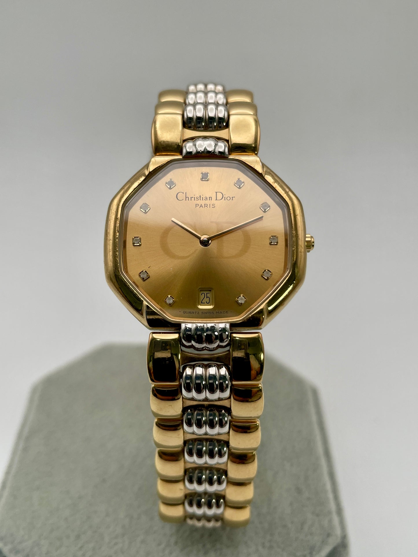 Christian Dior Déposé Octagon Vintage Women's Watch in two-tone gold and steel, front view highlighting the champagne dial with crystal markers.