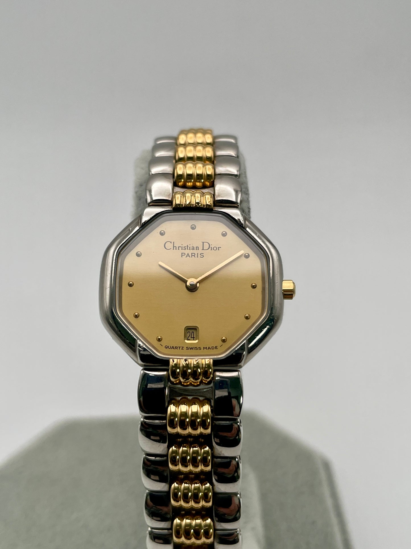 Christian Dior Déposé Octagon Vintage Women's Watch in two-tone steel and gold, front view showcasing the champagne dial and gold hour markers.