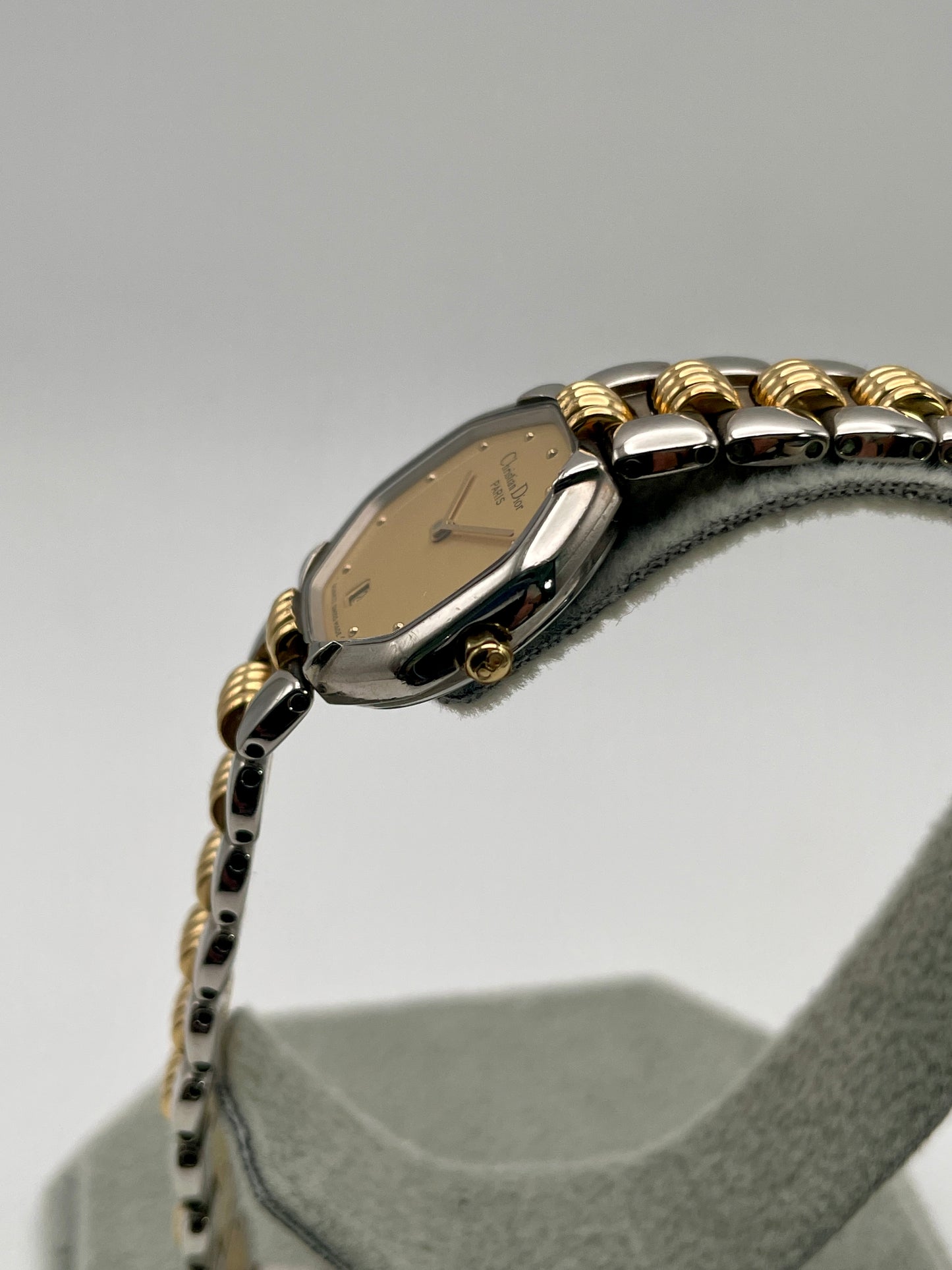 Left side view of Christian Dior Déposé Octagon Vintage Women's Watch, showcasing the gold crown and slim case profile.