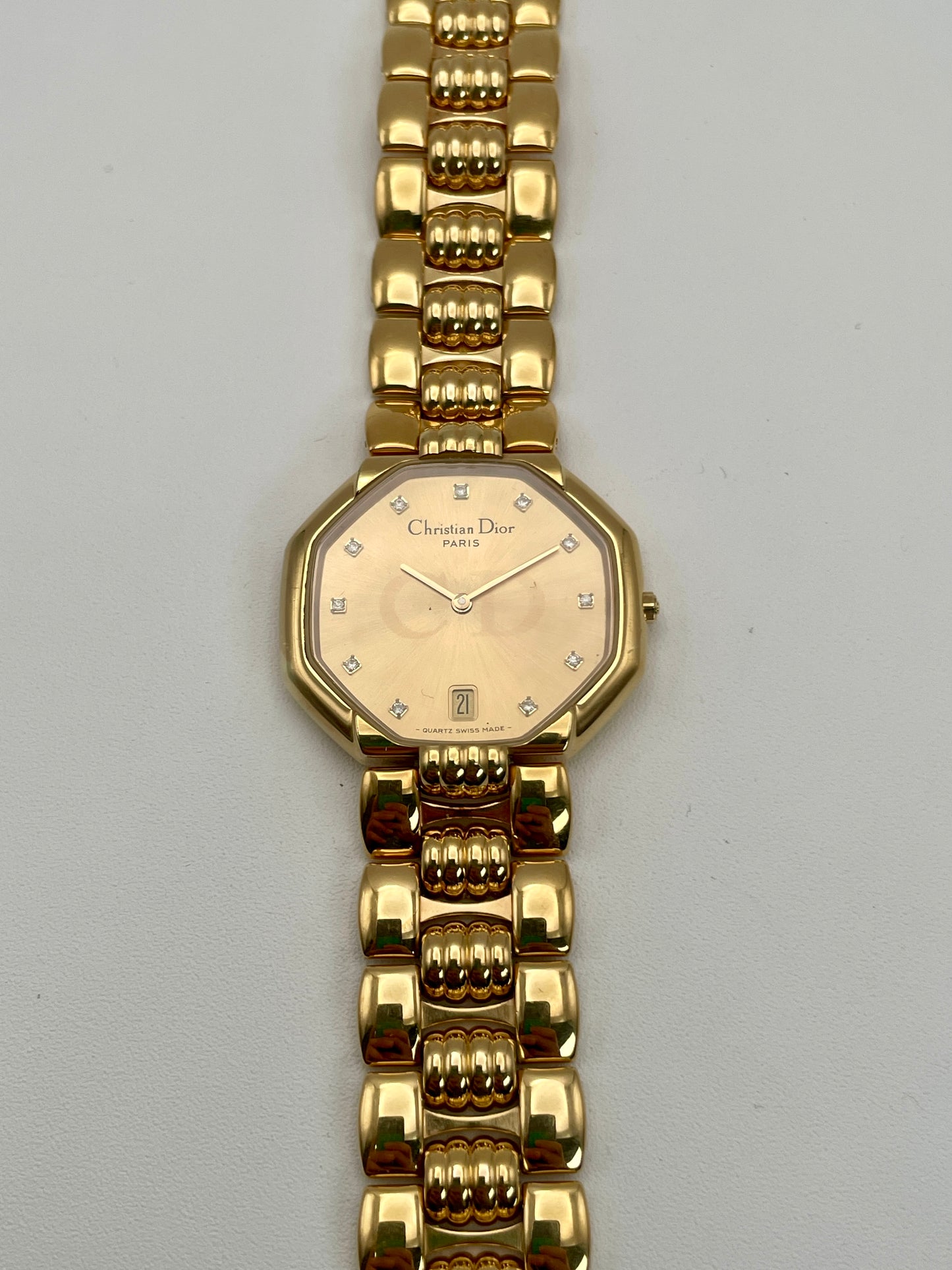 Front view of the Christian Dior Depose Vintage Women's Watch in gold with octagonal dial and diamond hour markers.