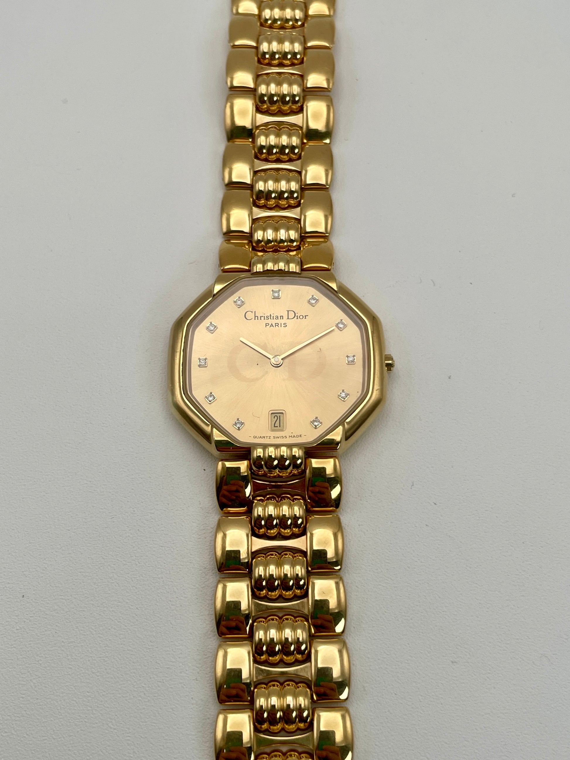 Front view of the Christian Dior Depose Vintage Women's Watch in gold with octagonal dial and diamond hour markers.