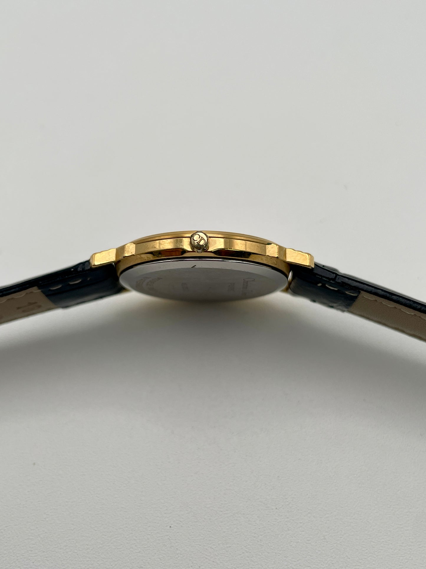 Side view of Christian Dior 45.122 watch showing crown with CD logo