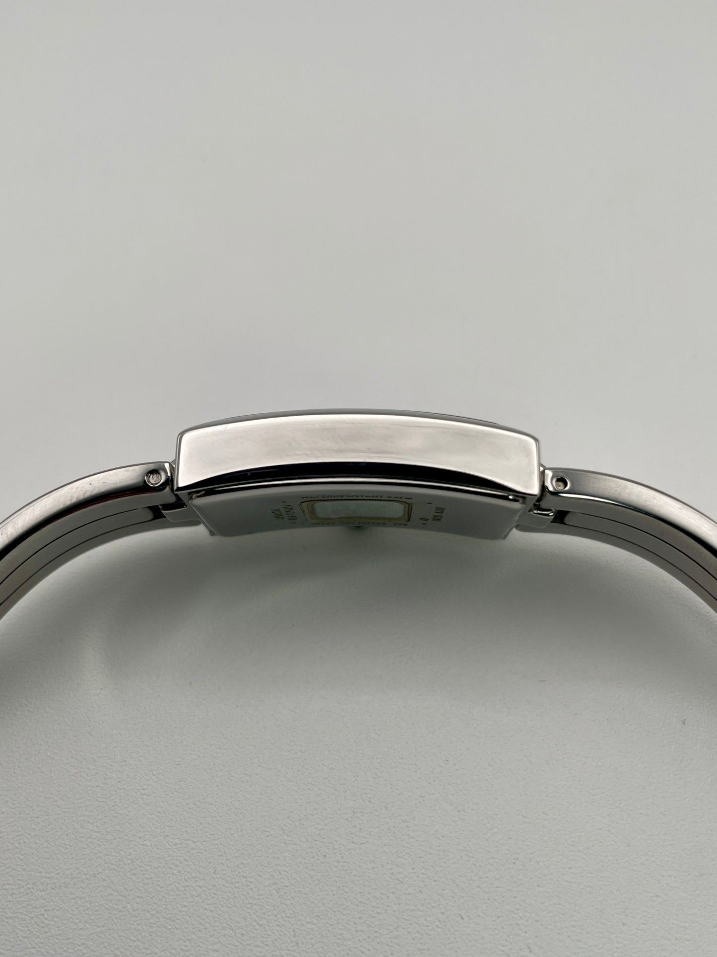 Non-crown side profile view emphasizing the slim design of the case