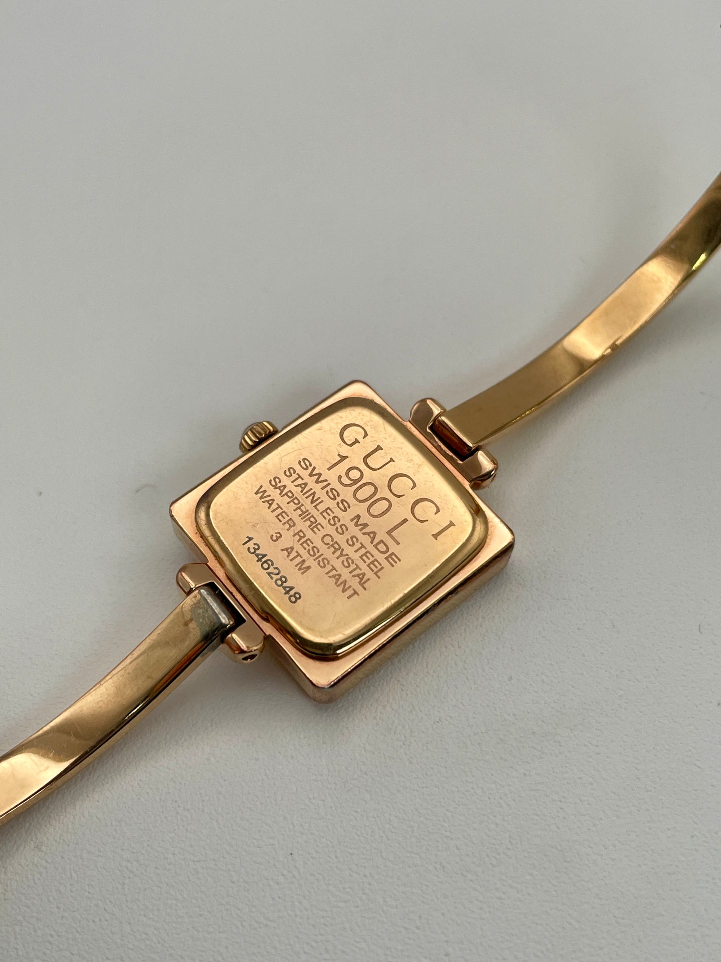 Back view of the Gucci 1900L vintage women's watch showing engraved details on the caseback.