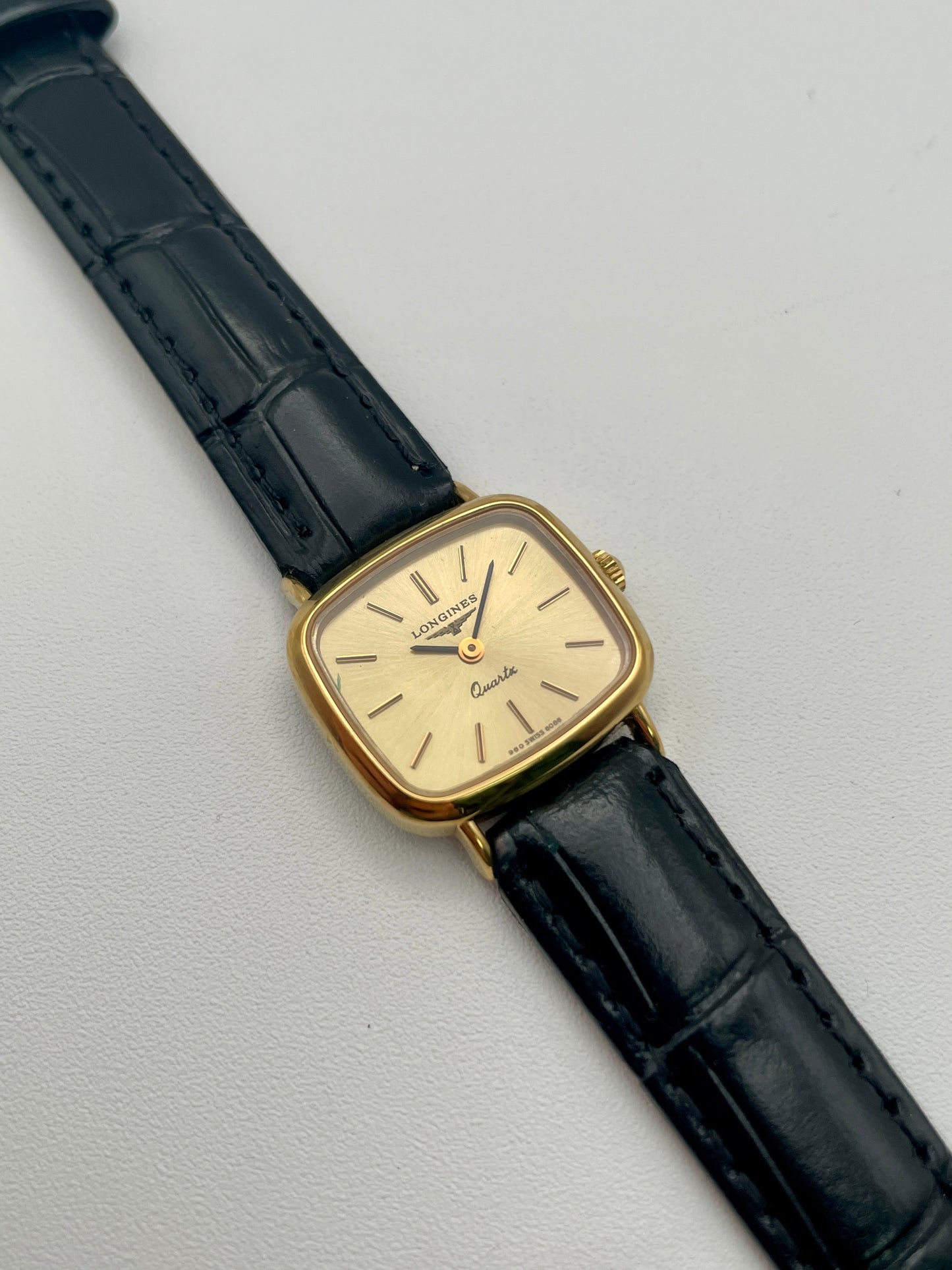 Main view of the Longines 6068.2 vintage women's watch showing champagne dial and gold-tone square case