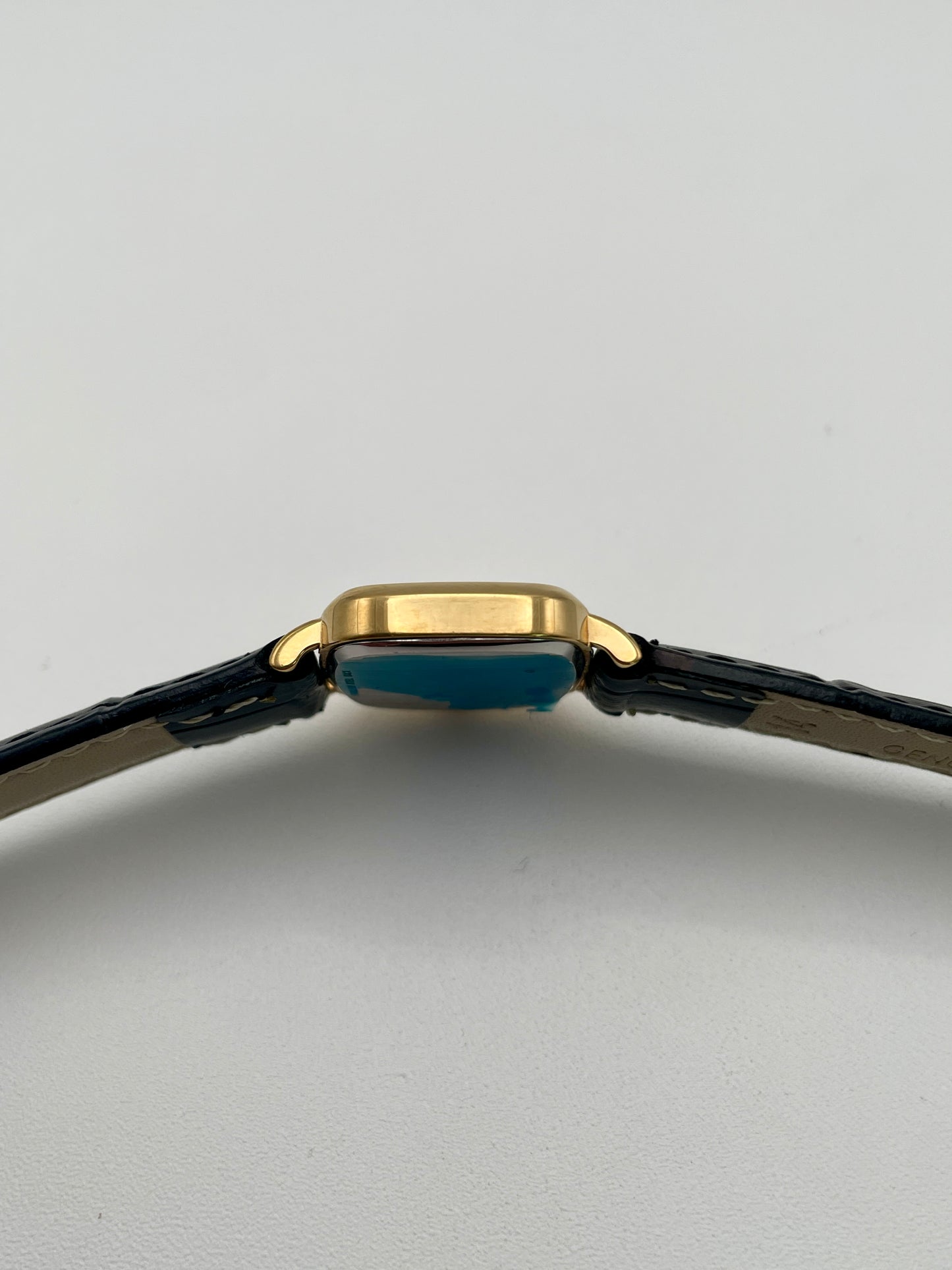 Side view of Longines 6068.2 highlighting the slim gold-tone case profile
