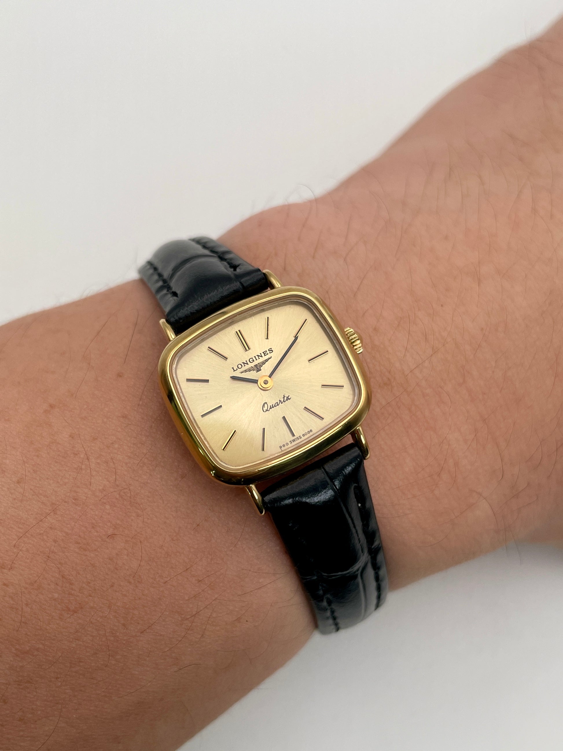 Longines 6068.2 vintage gold women's watch worn on wrist, showcasing size and strap fit