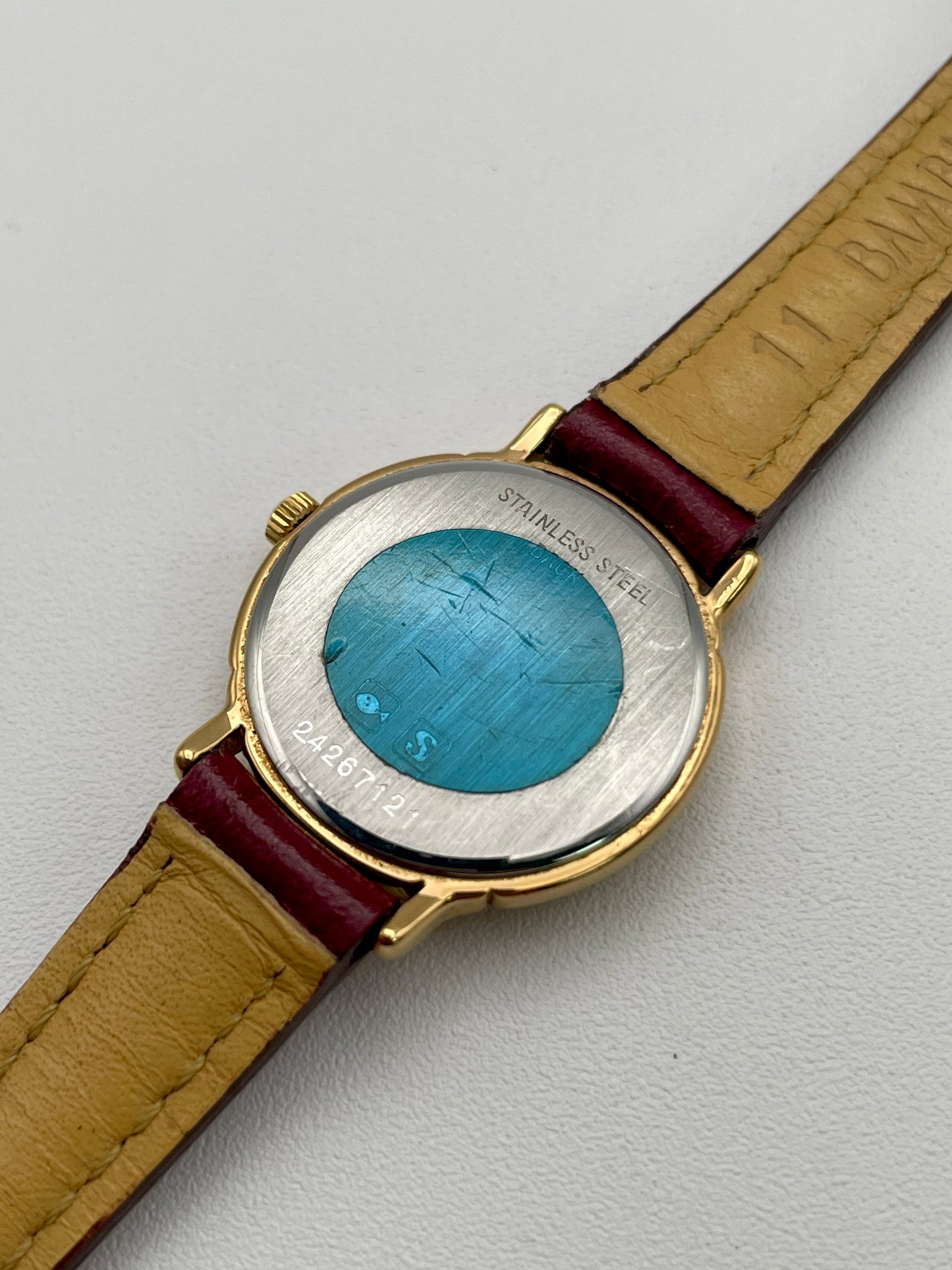 Caseback view of Longines L153.4 watch with serial number and stainless steel back