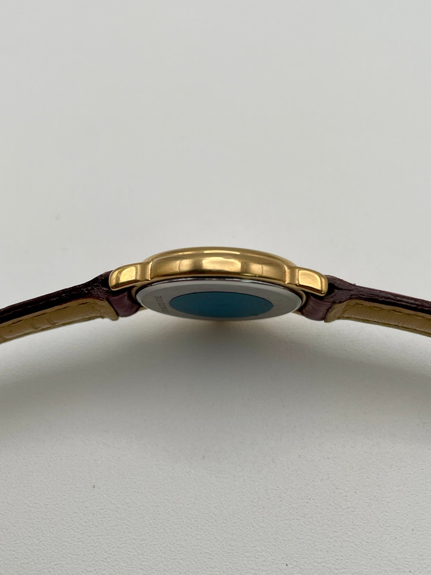 Side profile showing the slim case thickness of the Longines L153.4 watch