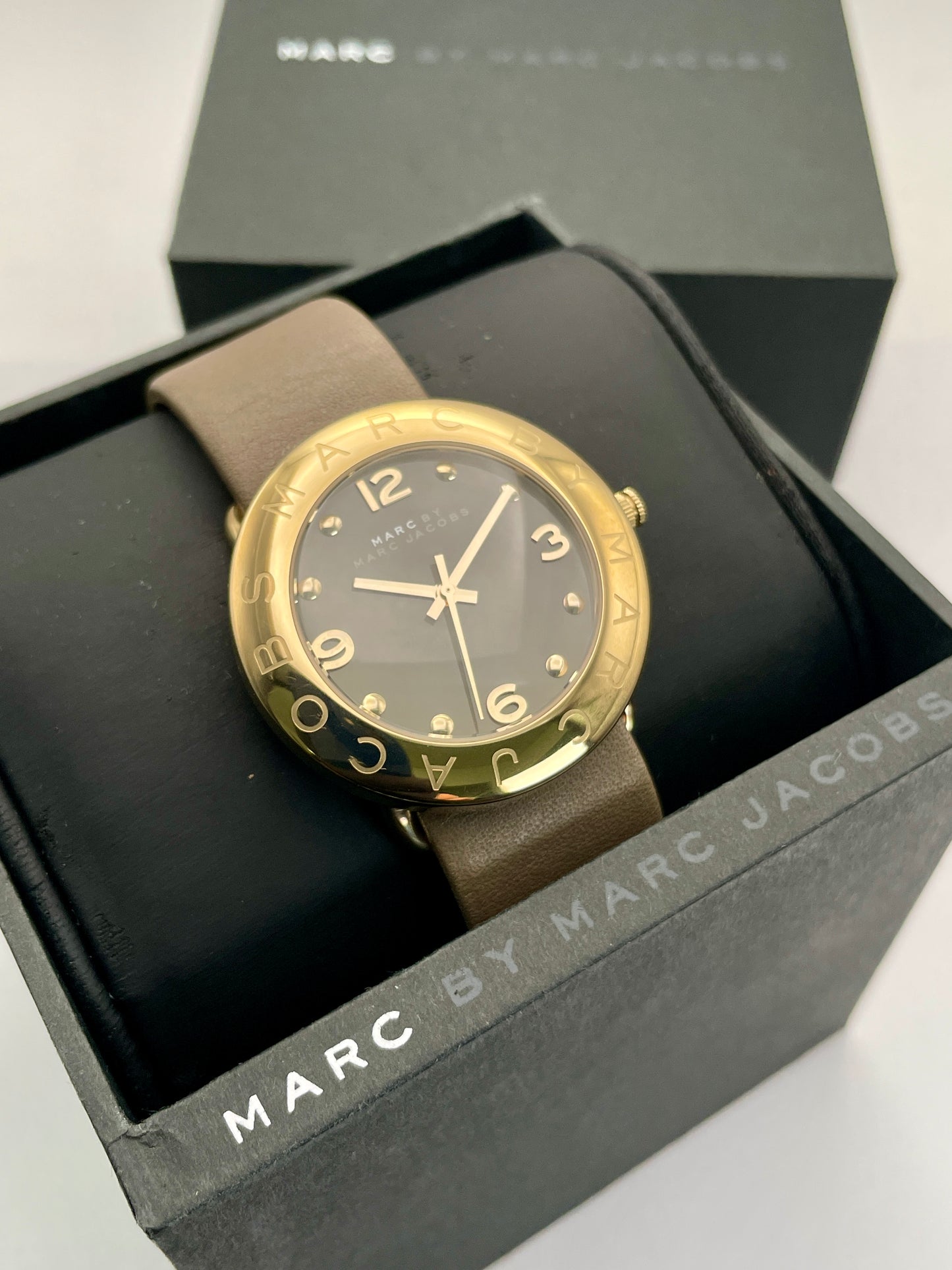 Marc by Marc Jacobs watch with gold-tone case and black dial in its original box with papers