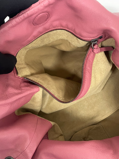 Detailed view of the interior zipper compartment in the Bottega Veneta Intrecciato Campana Shoulder Bag, highlighting its practical storage space.