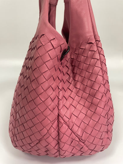 Side view of the Bottega Veneta Intrecciato Campana Shoulder Bag in pink woven leather, showing the detailed woven design and soft leather.