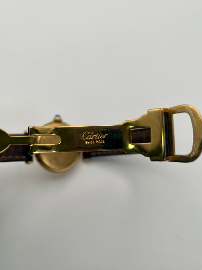 Clasp view of Cartier Colisée Vermeil watch with an engraved Cartier logo on the gold-tone buckle.