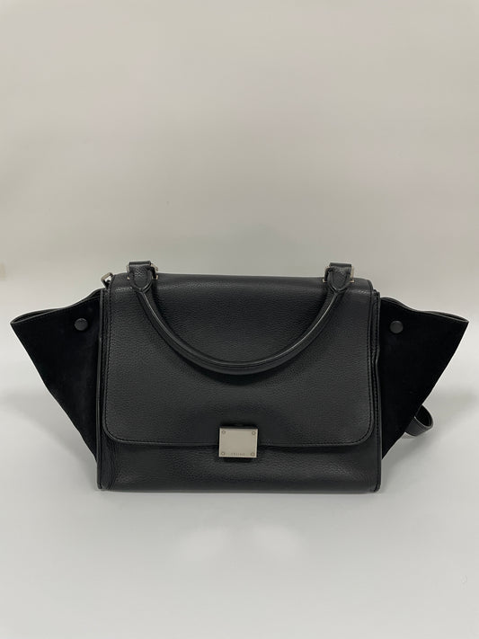 Celine Trapeze Bag in black leather with velvet trim, featuring a front flap and a silver-tone clasp, main front view.