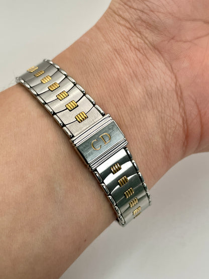 Bracelet clasp of Christian Dior 48.146 women's watch with "CD" logo engraving in two-tone design.