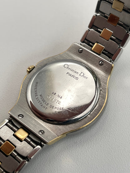 Caseback of Christian Dior 48.146 vintage watch showing stainless steel finish and engraved details.