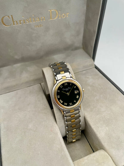 Christian Dior 48.146 women's two-tone watch displayed in its branded box with gold and steel bracelet.