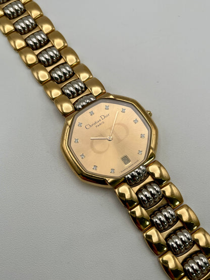 Christian Dior Déposé Octagon Vintage Women's Watch displayed flat with the unique two-tone gold and steel bracelet.