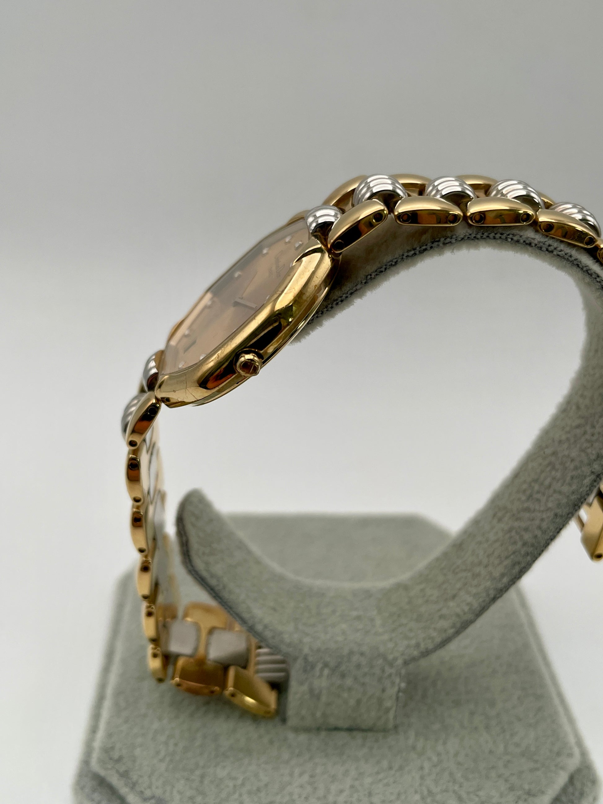 Left side view of Christian Dior Déposé Octagon Vintage Women's Watch, showcasing the gold crown and slim case profile.