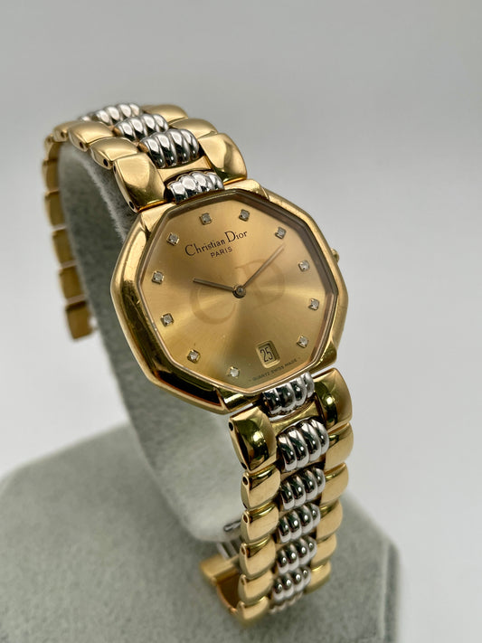 Christian Dior Déposé Octagon Vintage Women's Watch in two-tone gold and steel, front view highlighting the champagne dial with crystal markers.