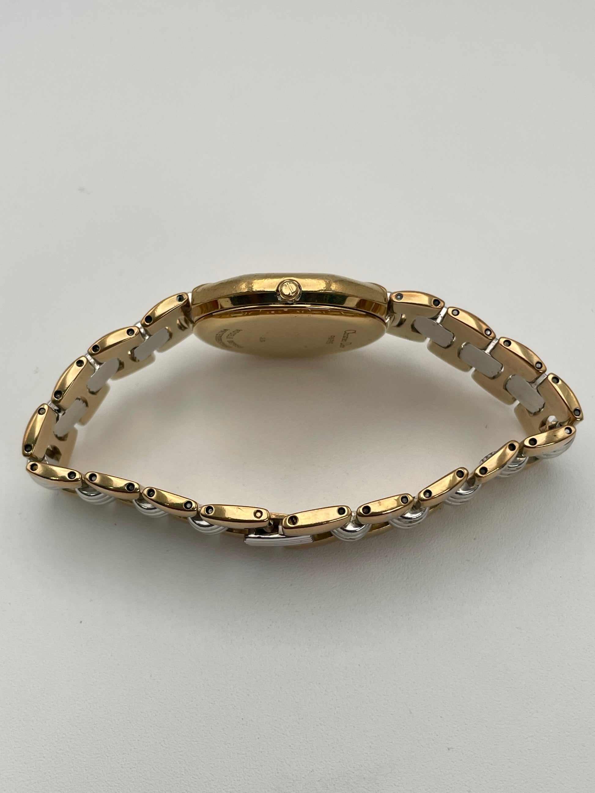 Side view of the Christian Dior Depose vintage watch, highlighting the case thickness and gold crown detail.