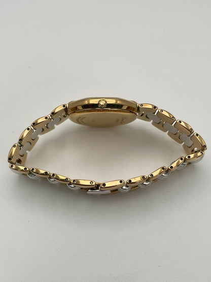 Side view of the Christian Dior Depose vintage watch, highlighting the case thickness and gold crown detail.