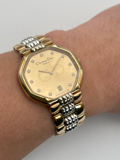 Wrist shot of the Christian Dior Depose vintage watch, displaying the two-tone bracelet and elegant dial on the wrist.