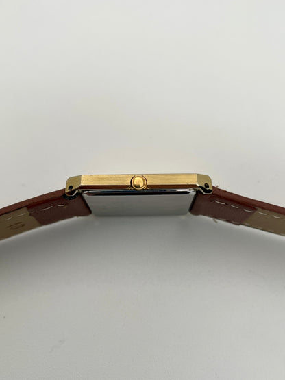 Close-up of the crown on Citizen Tank Vintage Watch with gold-tone case.