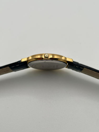 Side view of Christian Dior 45.122 watch showing crown with CD logo
