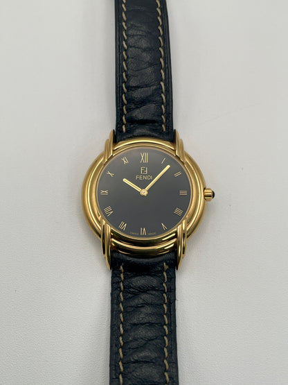 Close-up view of the Fendi 300J dial, showing refined Roman numerals and dauphine-style hands.