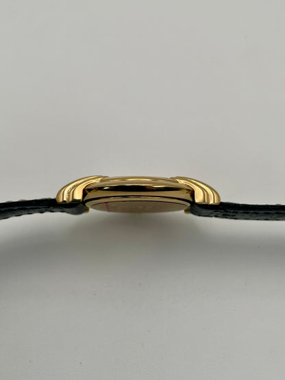 Side profile of the Fendi 300J showing the slim gold case and curved lugs.