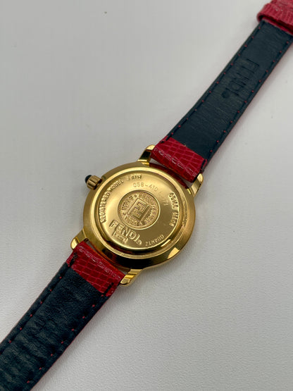 Caseback of the Fendi 410L watch showing engraved Fendi logo and model number on gold-tone back