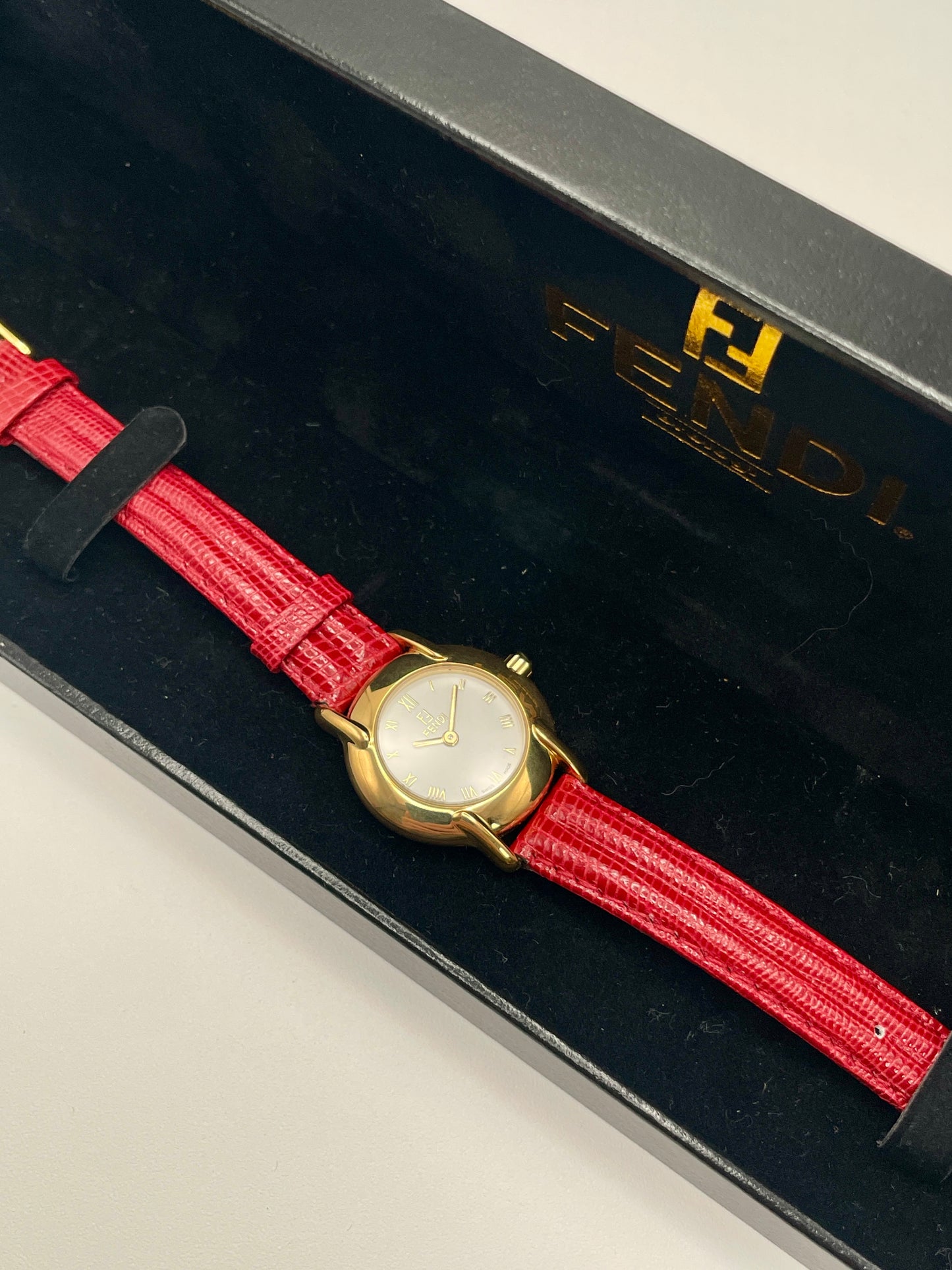 Fendi Orologi 410L Vintage Women's Watch in gold with red strap, displayed inside original Fendi box
