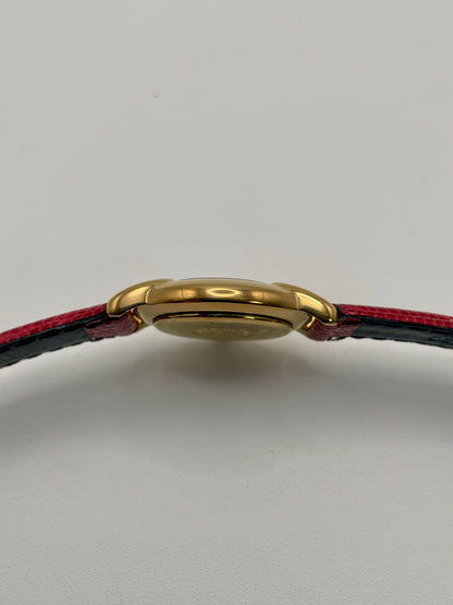 Side view of the watch case showing the thin gold profile of the Fendi 410L