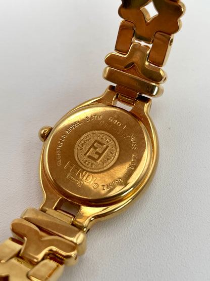 Close-up of the caseback of the Fendi 640L Vintage Women's Watch, displaying the engraved Fendi logo and serial number.