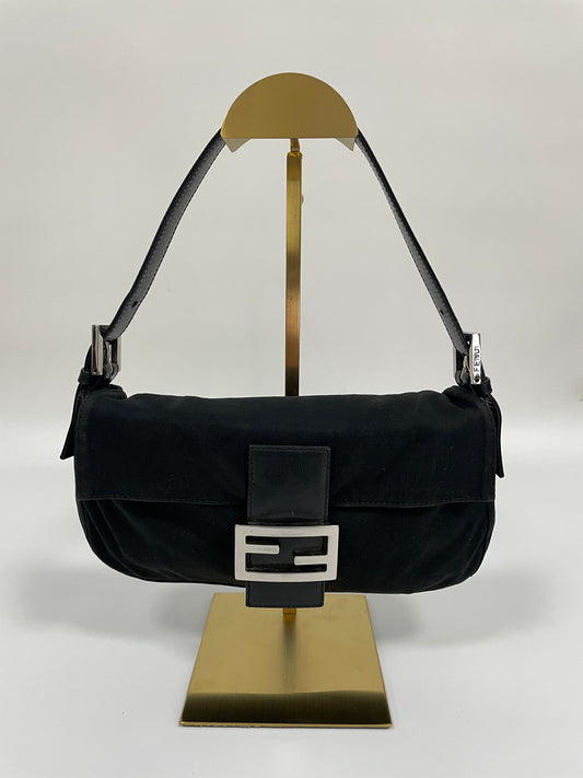 Front view of a Fendi Baguette Bag in black neoprene with silver-tone hardware and a black leather strap.