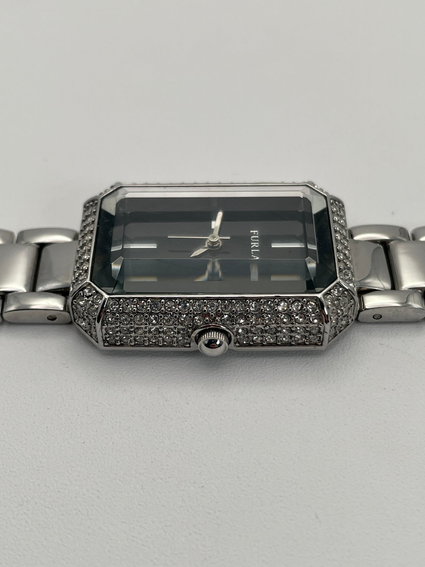 Side view focusing on the crown of the Furla Crystal Pave watch, emphasizing the crystal-set case and sleek bracelet.