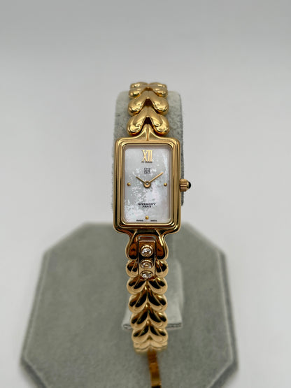 Front view of Givenchy Bambou Vintage Women’s Watch in gold with rectangular case, mother-of-pearl dial, and crystal-accented bracelet