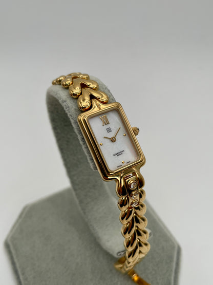 Front view of Givenchy Bambou Vintage Women’s Watch in gold with rectangular case, mother-of-pearl dial, and crystal-accented bracelet