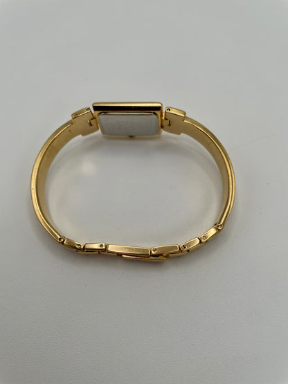 Side view showing the right bracelet links and case thickness of the Givenchy Millesime watch