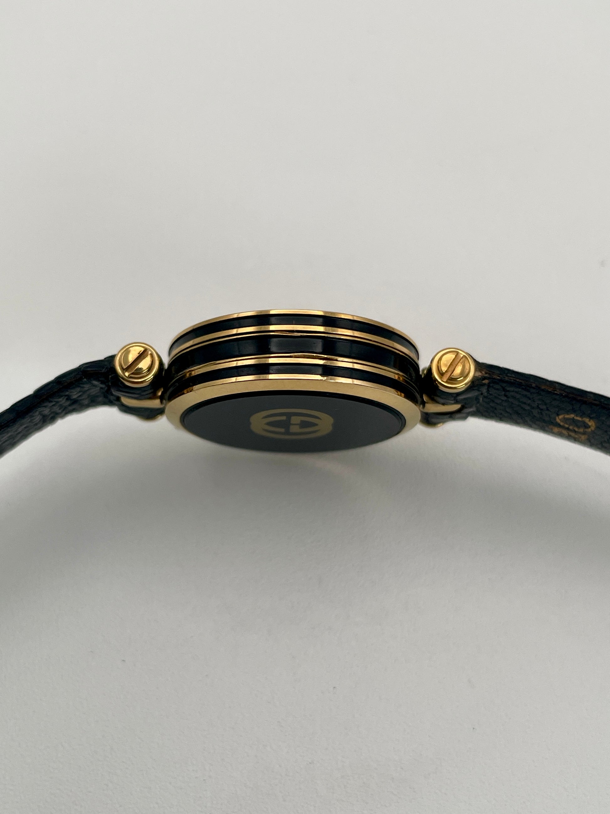 Side profile of the Gucci Sherry Line Vintage Women's Watch in gold, showcasing the dual-layered case.