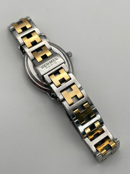 Close-up of the Hermès Clipper Vintage bracelet clasp with the engraved Hermès Paris logo.