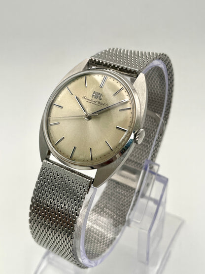 Diagonal view showcasing the steel case and elegant silver dial of the IWC Ref. 2403 VWS-2525.
