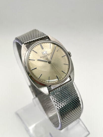 Front view of IWC Ref. 2403 VWS-2525 vintage watch in steel with minimalist dial.
