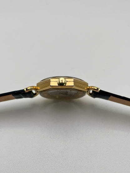 Close-up of the crown and case thickness of the Juvenia Octagion watch
